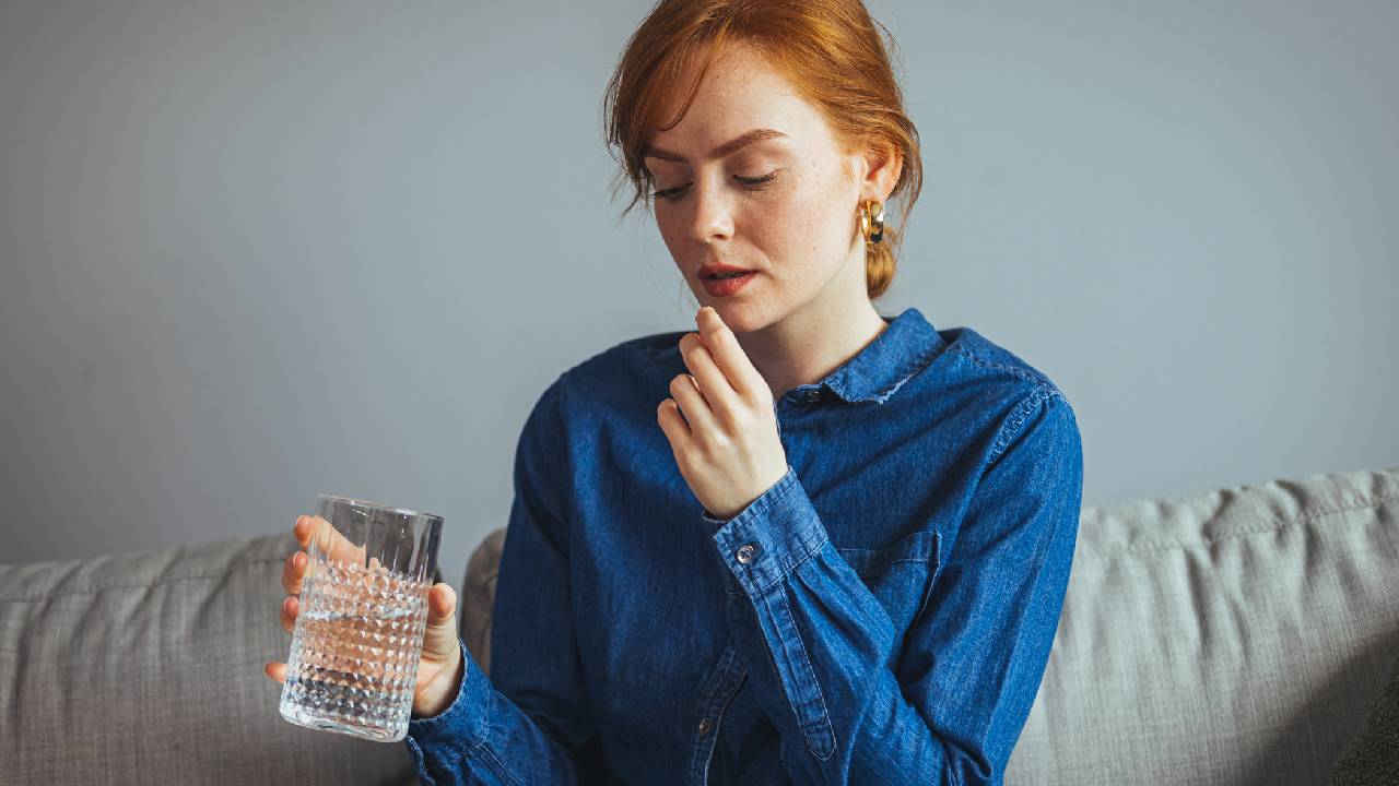 female-taking-tablet-glass-of-water-summary